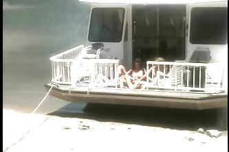 Sexy girl bends over and gets her pussy licked outside on a boat