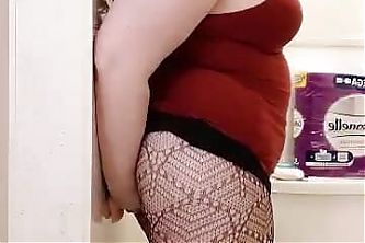 Thick Milf wearing Fishnets in Bathroom with Dildo Stuck to Wall in ASS